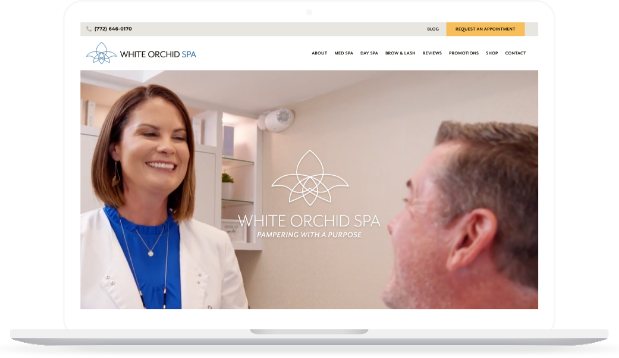 White Orchid Spa website video clips as seen on a laptop